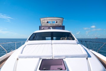 Tanning cushions on the bow of this yacht rental in Coconut Grove, Miami.